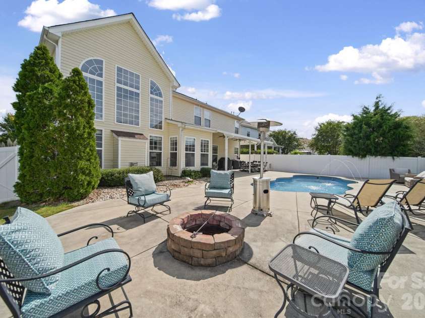 3604 Grovecreek Pond Drive, Concord, NC 28027.  MLS# CAR4428204, YatesRealty ID 54089. Backyard Oasis