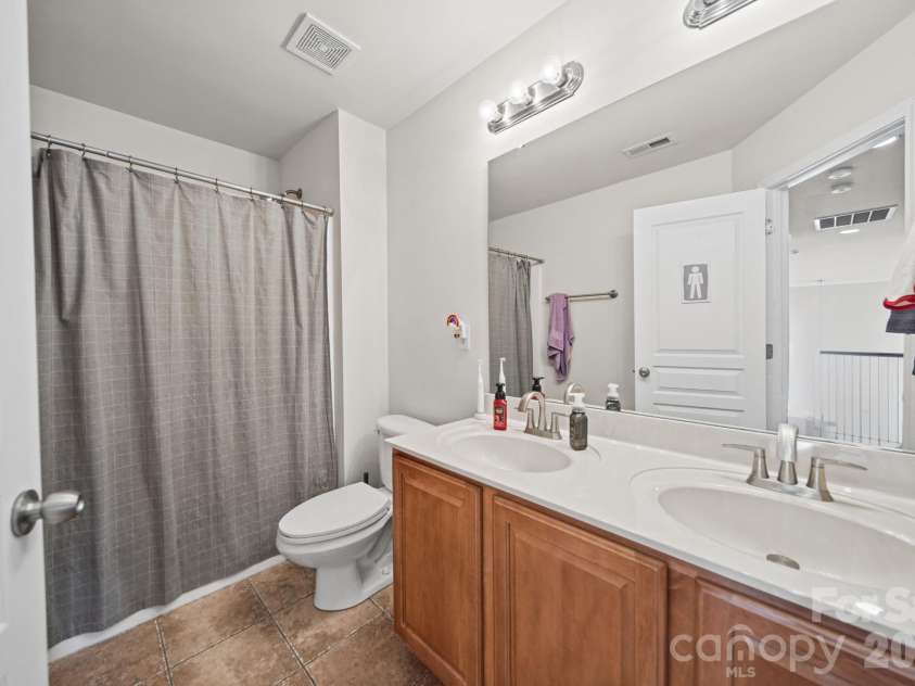 3604 Grovecreek Pond Drive, Concord, NC 28027.  MLS# CAR4428204, YatesRealty ID 54089. Full bath upstairs