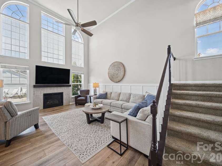 3604 Grovecreek Pond Drive, Concord, NC 28027.  MLS# CAR4428204, YatesRealty ID 54089. Great room with stairs