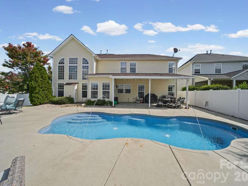 3604 Grovecreek Pond Drive, Concord, NC 28027.  MLS# CAR4428204, YatesRealty ID 54089. Heated Salt water pool