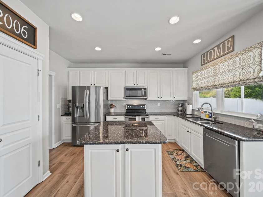 3604 Grovecreek Pond Drive, Concord, NC 28027.  MLS# CAR4428204, YatesRealty ID 54089. Kitchen view from great room