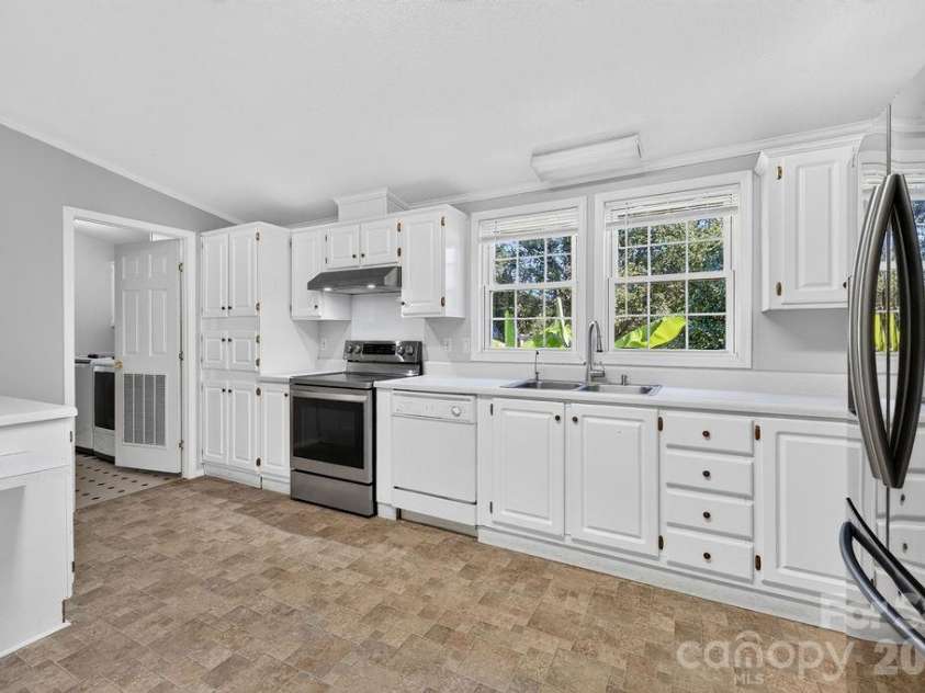 6041 Kaylas Ridge Road, Connelly Springs, NC 28612.  MLS# CAR4429448, YatesRealty ID 54091. Kitchen view from Great room