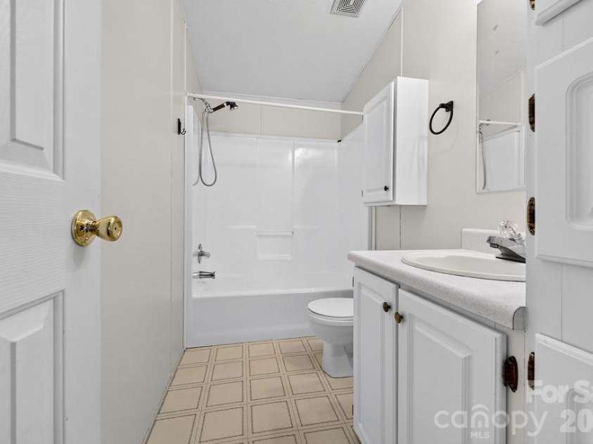 6041 Kaylas Ridge Road, Connelly Springs, NC 28612.  MLS# CAR4429448, YatesRealty ID 54091. Main bathroom