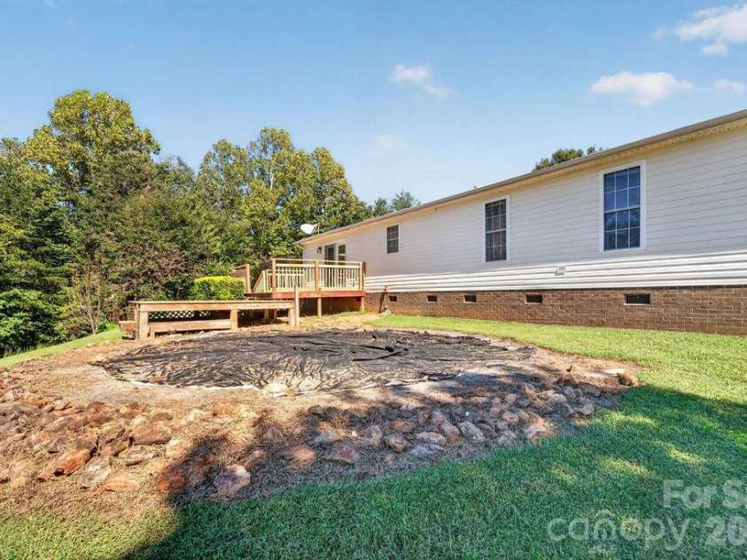 6041 Kaylas Ridge Road, Connelly Springs, NC 28612.  MLS# CAR4429448, YatesRealty ID 54091. Where to old pool once was