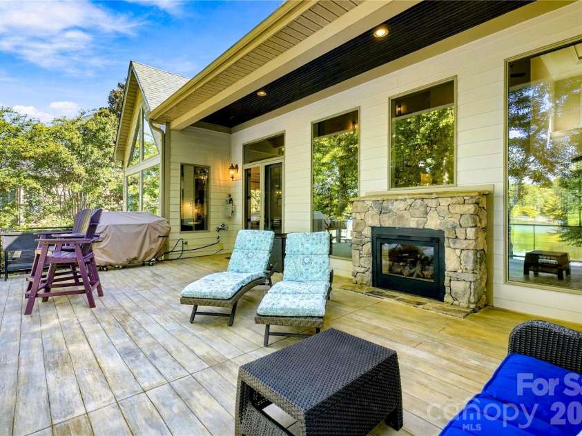 2227 Metcalf Drive, Sherrills Ford, NC 28673.  MLS# CAR4427696, YatesRealty ID 54092. Lovely back upper deck for grilling overlooking the lake with double sided fireplace