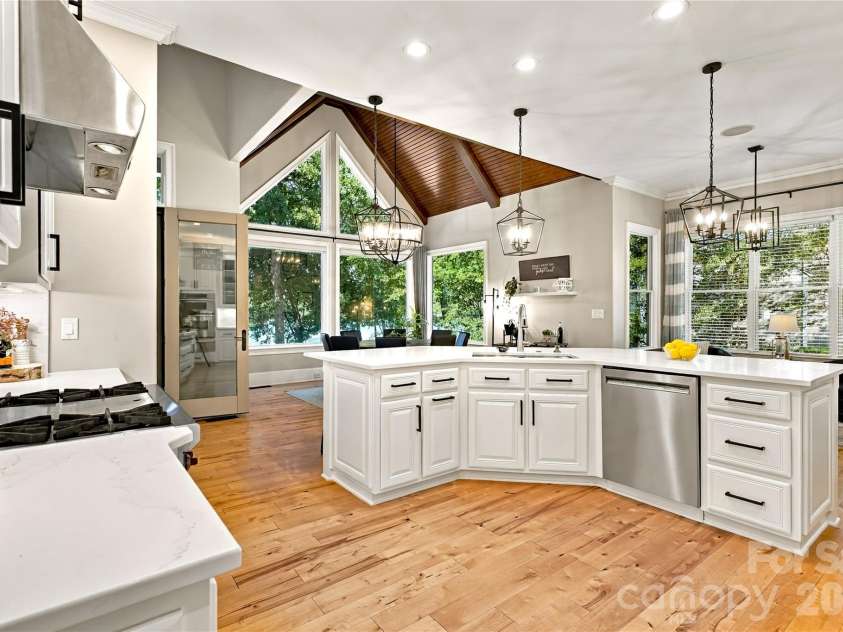 2227 Metcalf Drive, Sherrills Ford, NC 28673.  MLS# CAR4427696, YatesRealty ID 54092. Second view of kitchen - open floorplan to dining area and keeping room.