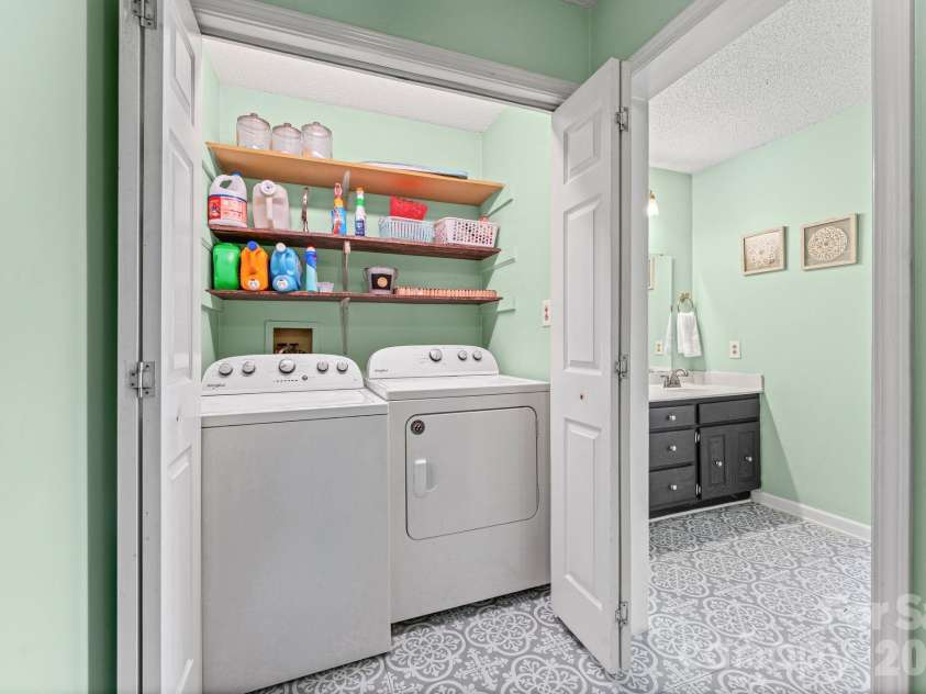 302 Hidden Creek Circle, Salisbury, NC 28147.  MLS# CAR4429824, YatesRealty ID 54105. Laundry Closet in Primary Bathroom