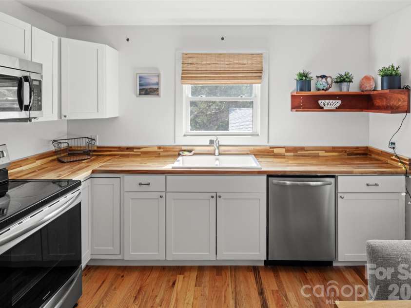 50 Long Cove Road, Candler, NC 28715.  MLS# CAR4430408, YatesRealty ID 54113. 