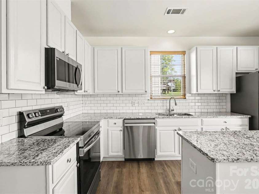 1530 Big Leaf Drive, Charlotte, NC 28262.  MLS# CAR4426949, YatesRealty ID 54132. 