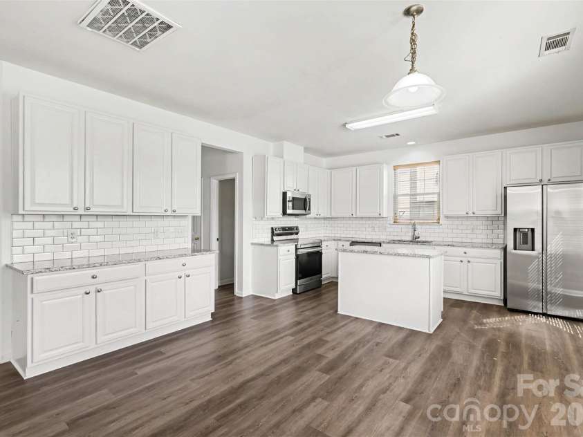 1530 Big Leaf Drive, Charlotte, NC 28262.  MLS# CAR4426949, YatesRealty ID 54132. 