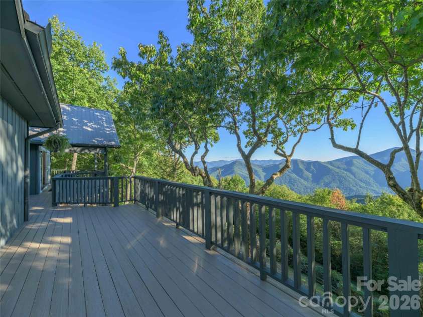 465 Leatherwood Road, Maggie Valley, NC 28751.  MLS# CAR4430446, YatesRealty ID 54136. Big, south-facing layered mtn views