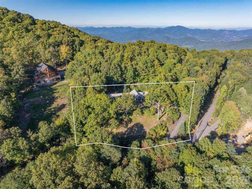 465 Leatherwood Road, Maggie Valley, NC 28751.  MLS# CAR4430446, YatesRealty ID 54136. High-elevation mountain retreat