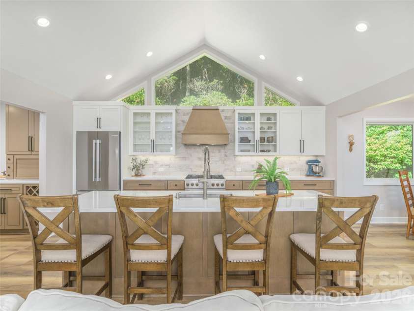 465 Leatherwood Road, Maggie Valley, NC 28751.  MLS# CAR4430446, YatesRealty ID 54136. Large island for gathering