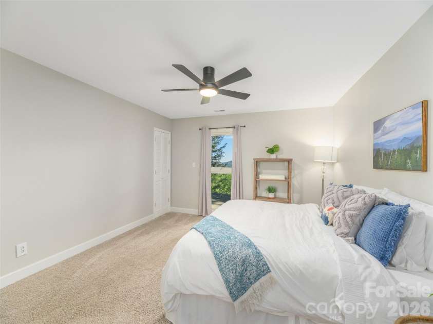 465 Leatherwood Road, Maggie Valley, NC 28751.  MLS# CAR4430446, YatesRealty ID 54136. Lower level primary suite #4