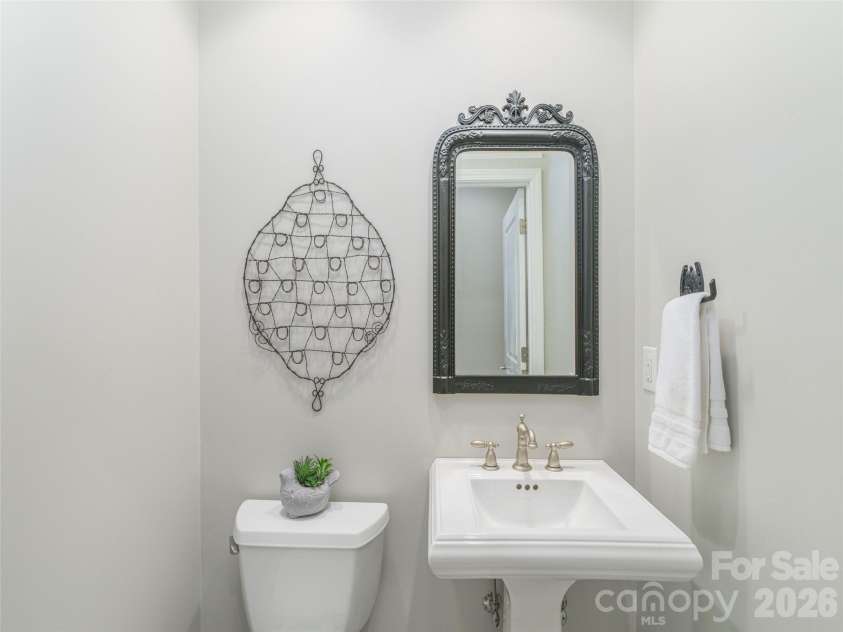 465 Leatherwood Road, Maggie Valley, NC 28751.  MLS# CAR4430446, YatesRealty ID 54136. Main level half-bath