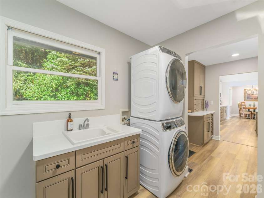 465 Leatherwood Road, Maggie Valley, NC 28751.  MLS# CAR4430446, YatesRealty ID 54136. Main level laundry