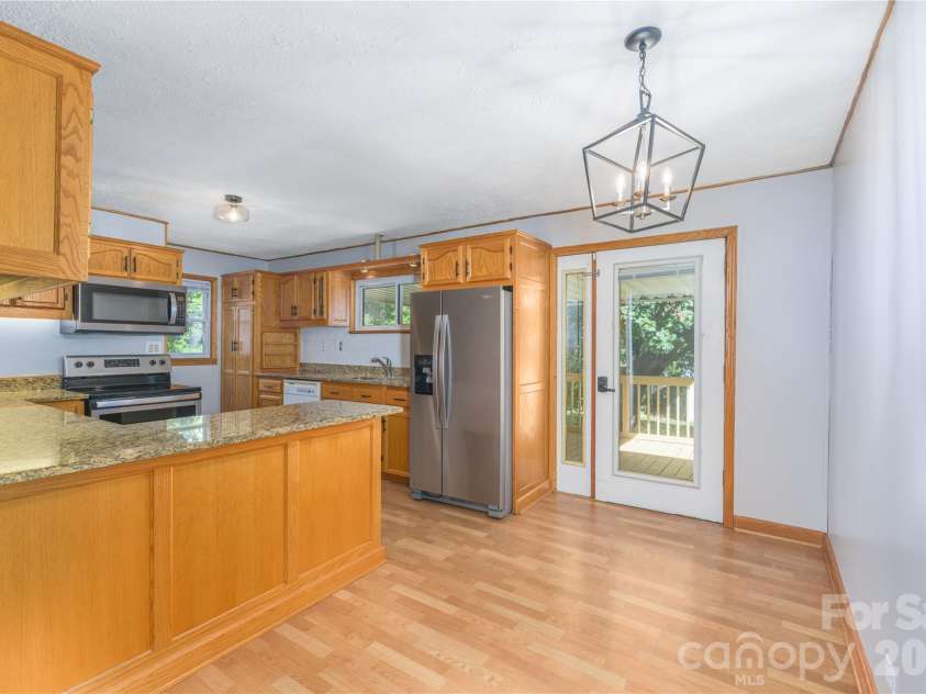 550 Enka Lake Road, Candler, NC 28715.  MLS# CAR4430159, YatesRealty ID 54146. 