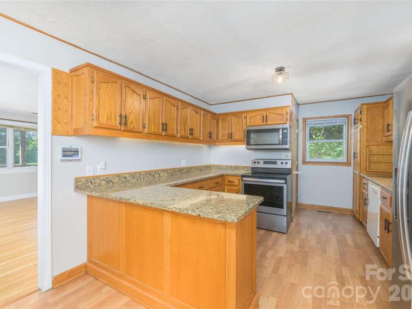 550 Enka Lake Road, Candler, NC 28715.  MLS# CAR4430159, YatesRealty ID 54146. 