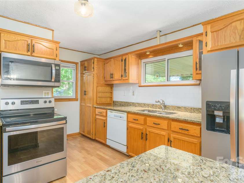 550 Enka Lake Road, Candler, NC 28715.  MLS# CAR4430159, YatesRealty ID 54146. 