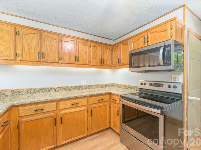 550 Enka Lake Road, Candler, NC 28715.  MLS# CAR4430159, YatesRealty ID 54146. 