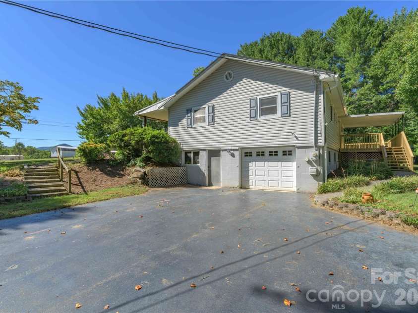 550 Enka Lake Road, Candler, NC 28715.  MLS# CAR4430159, YatesRealty ID 54146. 