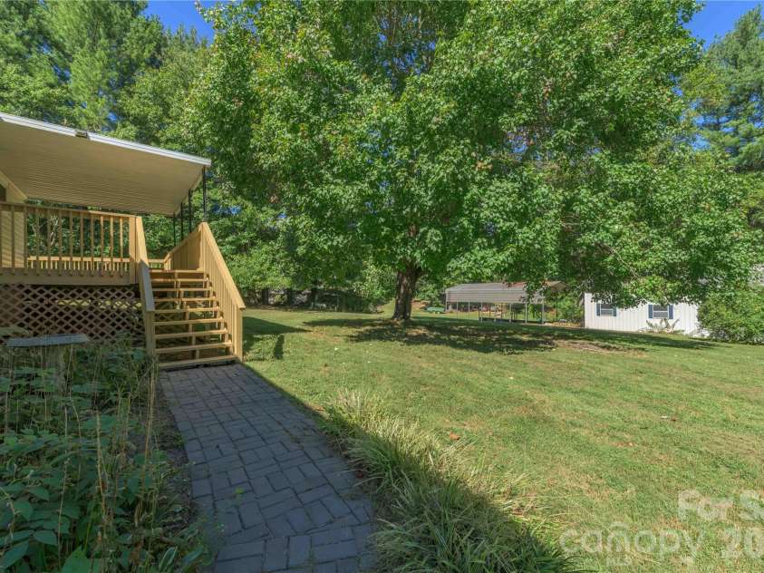 550 Enka Lake Road, Candler, NC 28715.  MLS# CAR4430159, YatesRealty ID 54146. 