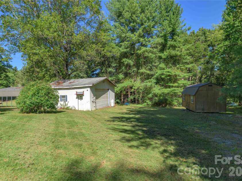 550 Enka Lake Road, Candler, NC 28715.  MLS# CAR4430159, YatesRealty ID 54146. 