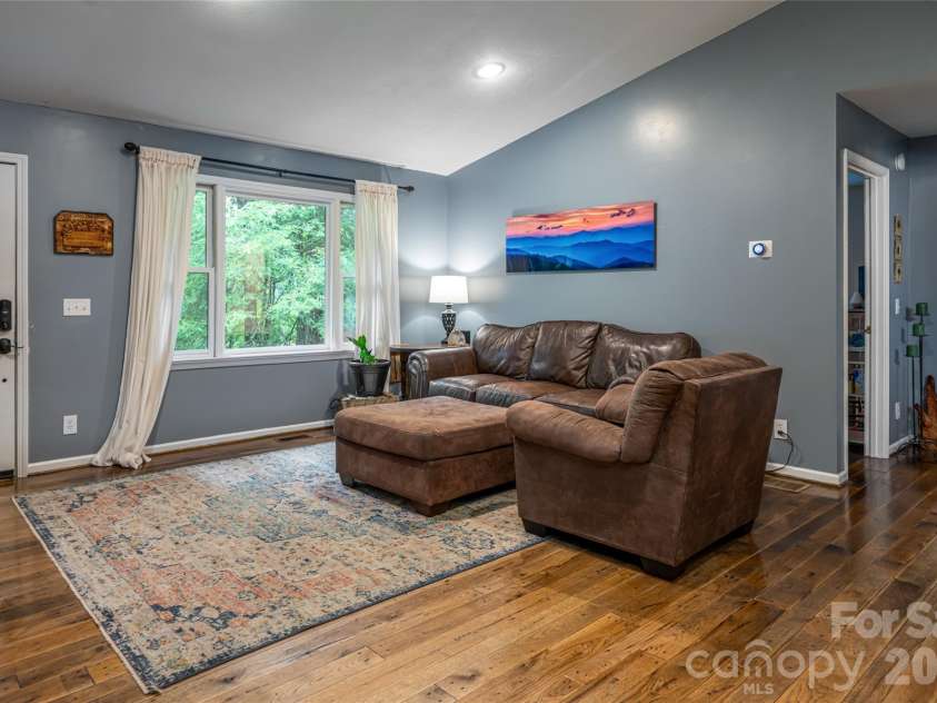 19 Forge Drive, Mills River, NC 28759.  MLS# CAR4429305, YatesRealty ID 54159. Spacious Living Room with Large-Panned Window