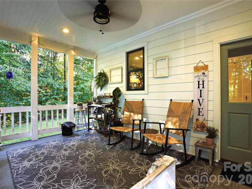 9560 Harvest Lane, Davidson, NC 28036.  MLS# CAR4429858, YatesRealty ID 54162. Side Porch