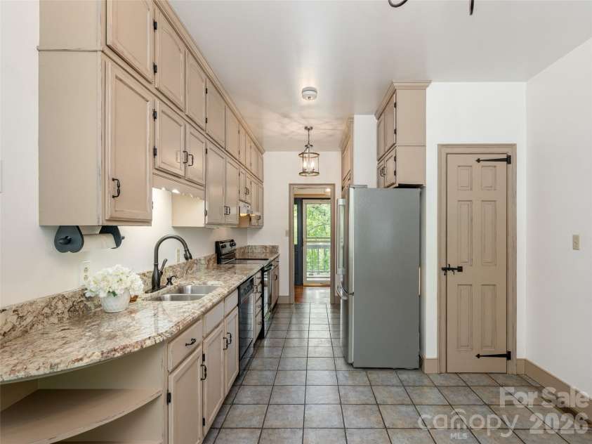116 Sams Branch Road, Candler, NC 28715.  MLS# CAR4430077, YatesRealty ID 54177. 