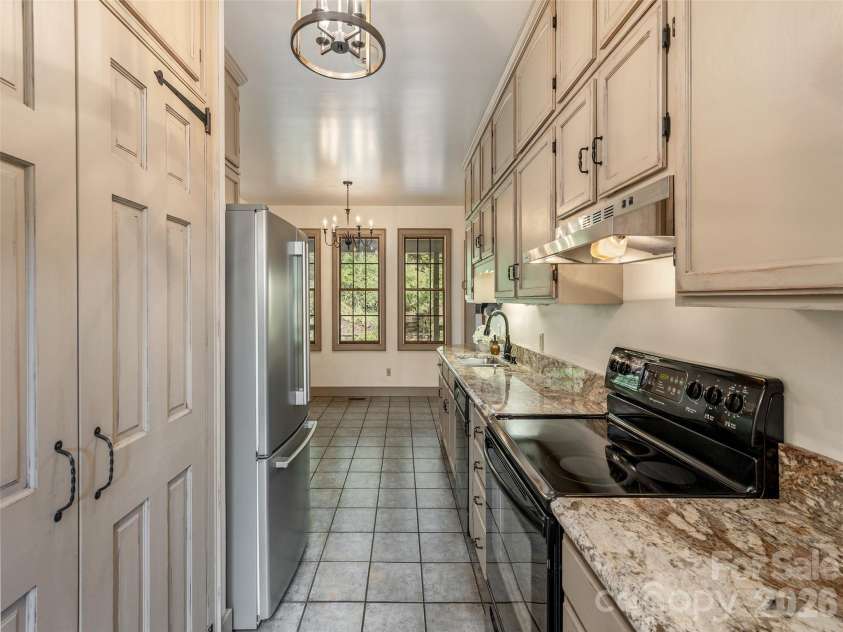 116 Sams Branch Road, Candler, NC 28715.  MLS# CAR4430077, YatesRealty ID 54177. 