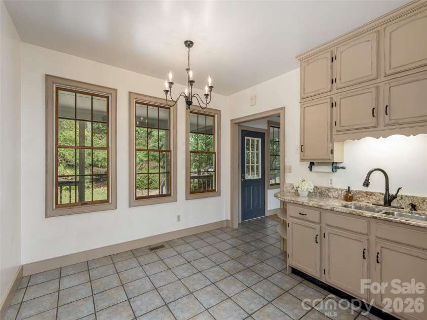 116 Sams Branch Road, Candler, NC 28715.  MLS# CAR4430077, YatesRealty ID 54177. 