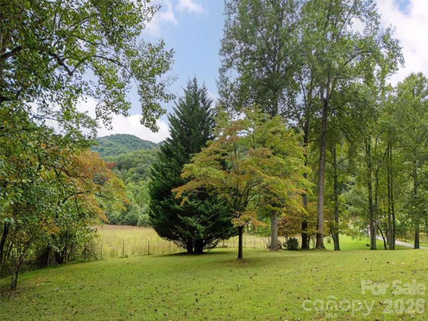 116 Sams Branch Road, Candler, NC 28715.  MLS# CAR4430077, YatesRealty ID 54177. 