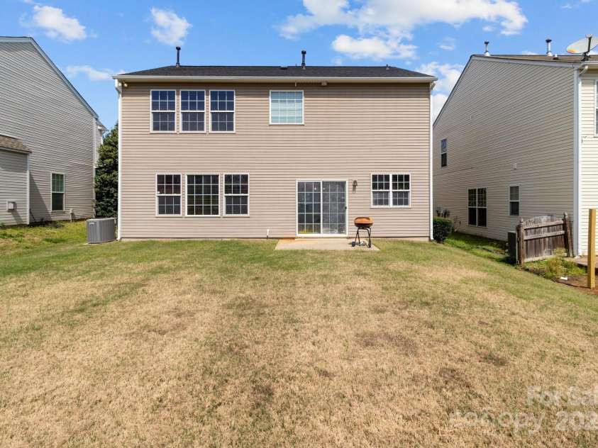 2319 Arbor Vista Drive, Charlotte, NC 28262.  MLS# CAR4240928, YatesRealty ID 5420. Back yard