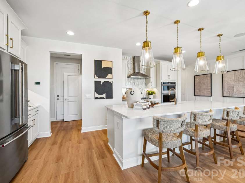 25029 Sprenger Drive, Cornelius, NC 28031.  MLS# CAR4430610, YatesRealty ID 54200. Sample Photo Only - Model Home - Interior Unit Shown