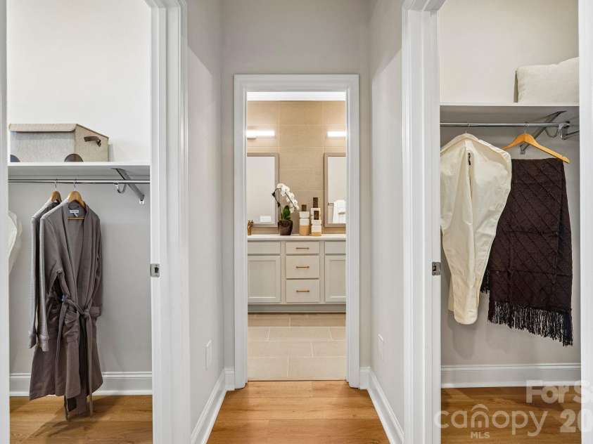 25029 Sprenger Drive, Cornelius, NC 28031.  MLS# CAR4430610, YatesRealty ID 54200. Sample Photo Only - Model Home - Interior Unit Shown - Dual Primary Closets