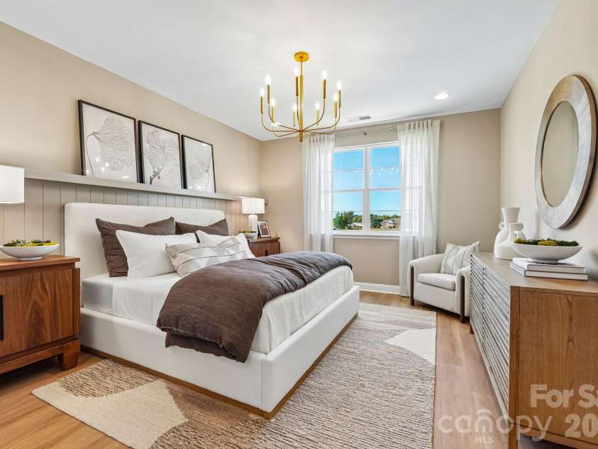 25029 Sprenger Drive, Cornelius, NC 28031.  MLS# CAR4430610, YatesRealty ID 54200. Sample Photo Only - Model Home - Interior Unit Shown - Primary Bedroom
