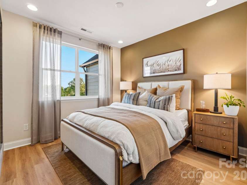 25029 Sprenger Drive, Cornelius, NC 28031.  MLS# CAR4430610, YatesRealty ID 54200. Sample Photo Only - Model Home - Interior Unit Shown - Secondary Bedroom