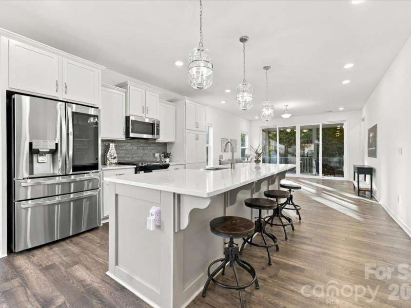 24550 Blue Heron Circle, Lancaster, SC 29720.  MLS# CAR4428673, YatesRealty ID 54208. Kitchen with island seating