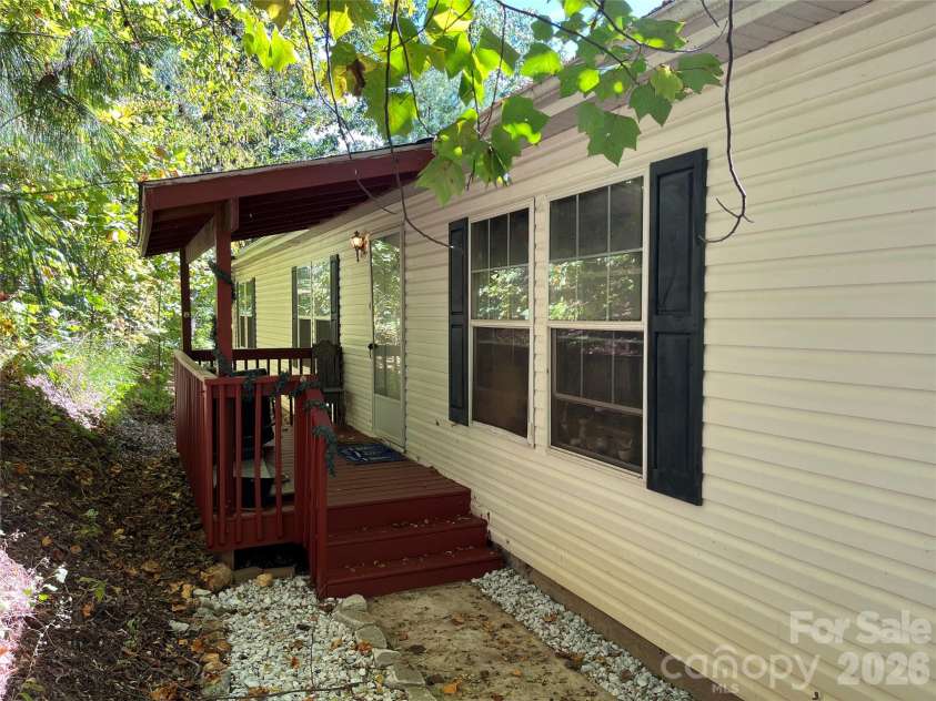 121 Hidden Meadow Drive, Candler, NC 28715.  MLS# CAR4430156, YatesRealty ID 54224. Front entry and porch