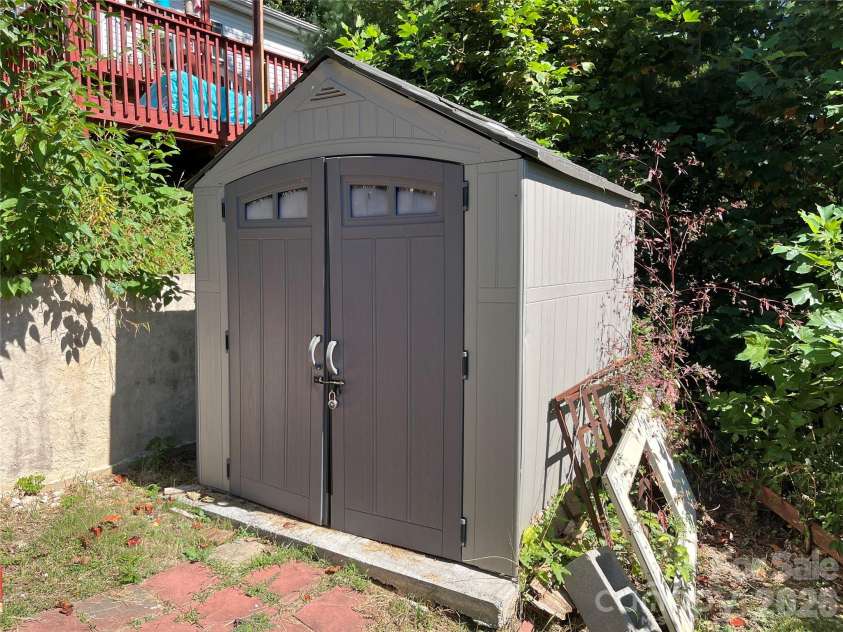 121 Hidden Meadow Drive, Candler, NC 28715.  MLS# CAR4430156, YatesRealty ID 54224. Garden shed
