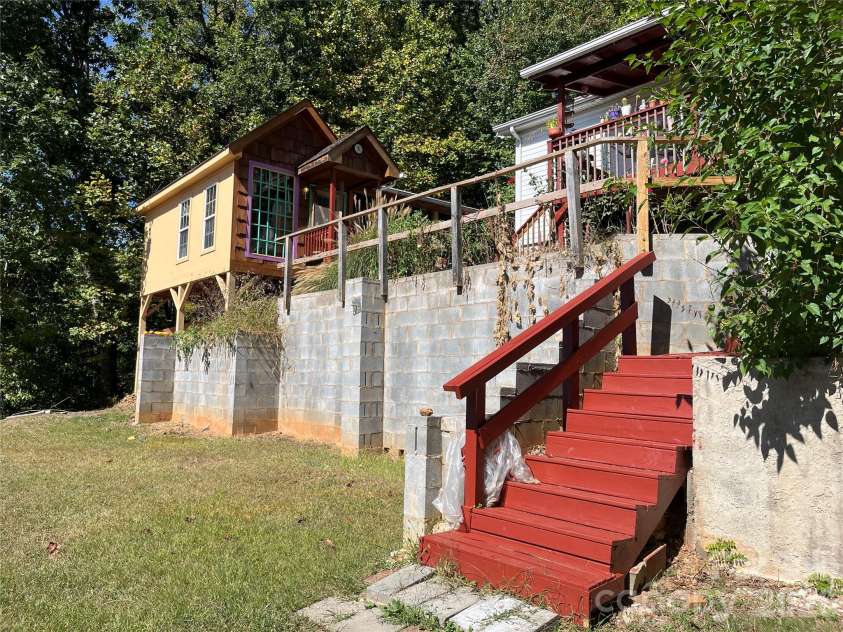 121 Hidden Meadow Drive, Candler, NC 28715.  MLS# CAR4430156, YatesRealty ID 54224. Level yard area