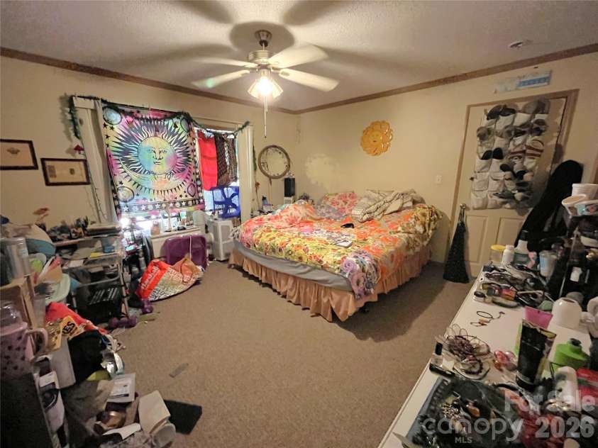 121 Hidden Meadow Drive, Candler, NC 28715.  MLS# CAR4430156, YatesRealty ID 54224. Primary bedroom