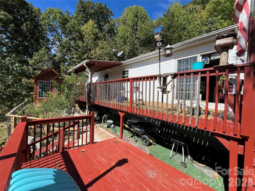 121 Hidden Meadow Drive, Candler, NC 28715.  MLS# CAR4430156, YatesRealty ID 54224. Rear decks