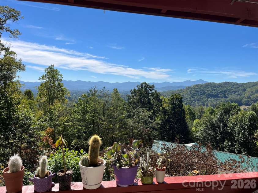 121 Hidden Meadow Drive, Candler, NC 28715.  MLS# CAR4430156, YatesRealty ID 54224. View from back porch