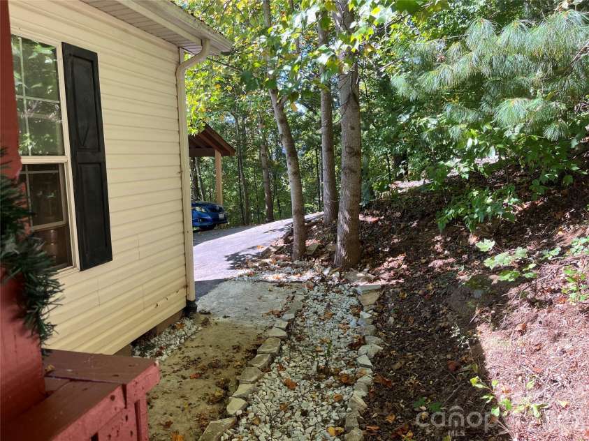 121 Hidden Meadow Drive, Candler, NC 28715.  MLS# CAR4430156, YatesRealty ID 54224. Walkway to driveway