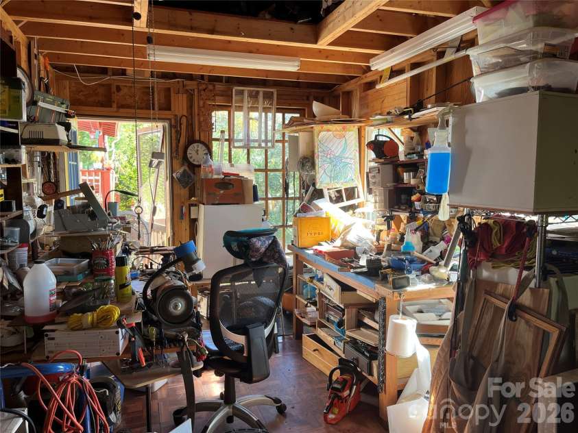121 Hidden Meadow Drive, Candler, NC 28715.  MLS# CAR4430156, YatesRealty ID 54224. Workshop interior
