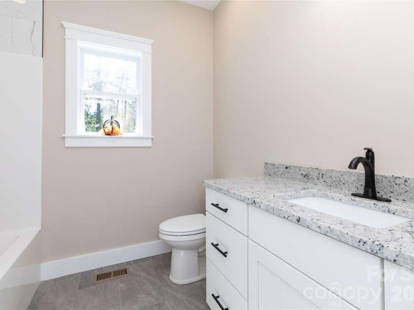 64 Cherry Cove Way, Old Fort, NC 28762.  MLS# CAR4427968, YatesRealty ID 54227. Guest Bath