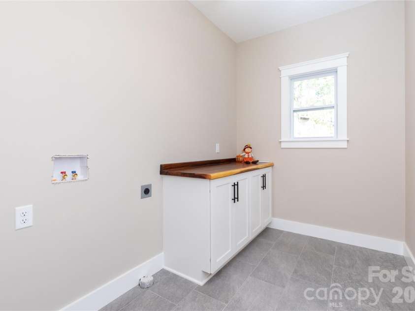 64 Cherry Cove Way, Old Fort, NC 28762.  MLS# CAR4427968, YatesRealty ID 54227. Laundry Room