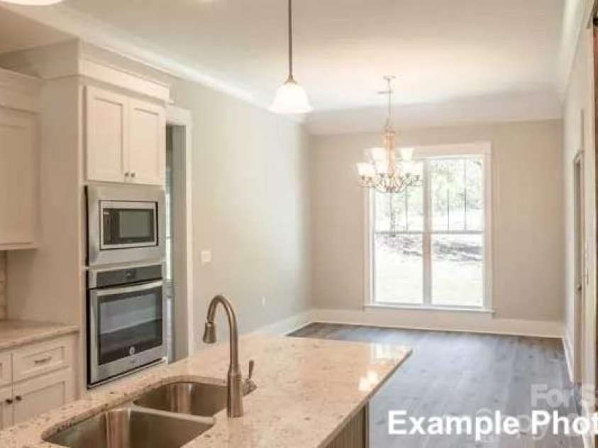 194 Sams Way, Statesville, NC 28625.  MLS# CAR4428928, YatesRealty ID 54228. Craftsman House Plan #50-249 - Dining Room